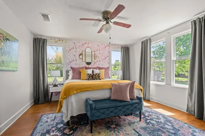 Relax in the serene embrace of this Master Suite, where soft hues and tranquil ambiance create the perfect sanctuary for unwinding after a long day.