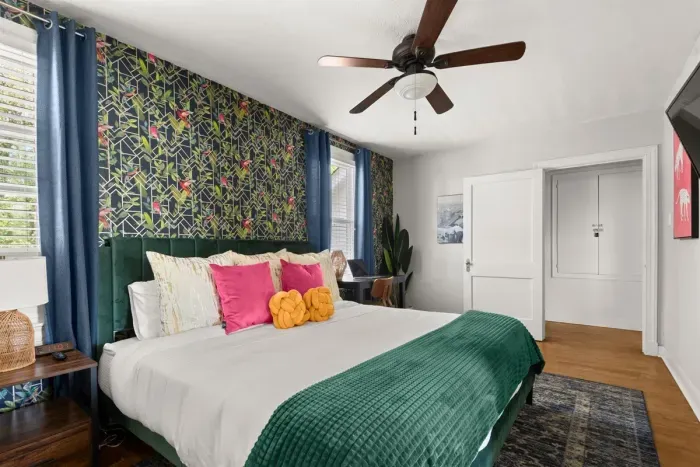 Sink into ultimate comfort in the inviting ambiance of the third bedroom, where a cozy bed awaits to envelop you in peaceful slumber.