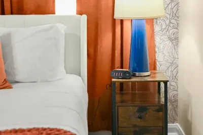 Chic comfort: The perfect touch of elegance with our stylish blue lamp bedside