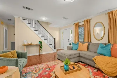 Ascend up the stairs from the living area to the two King guest suites.