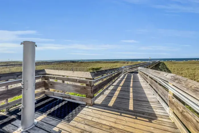 Rinse off the sand in this shower at the top of the board walk.