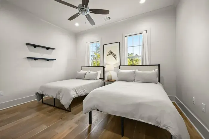 Spacious double bedroom with two cozy beds—ideal for friends, kids, or extra guests