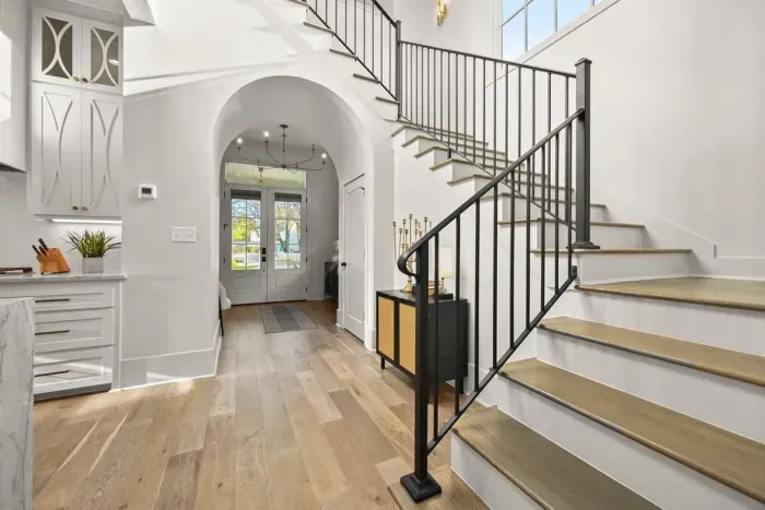 Amazing wide stairs with a beautiful viewpoint out of the massive window