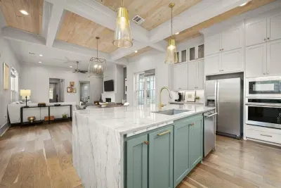 Waterfall granite countertops in the very modern and luxurious kitchen