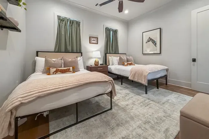 Spacious double bedroom with two cozy beds—ideal for friends, kids, or extra guests