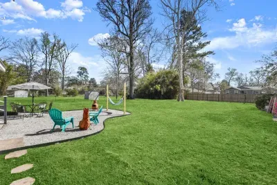 Half acre fenced in back yard space.