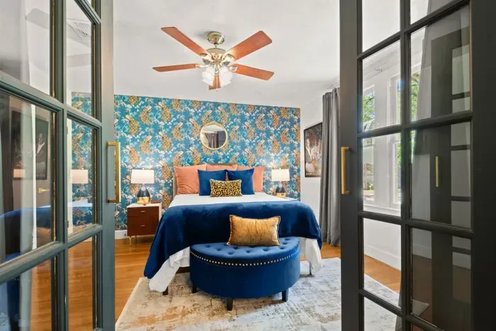 Enjoy an ambiance of natural lighting in this beautiful bedroom.