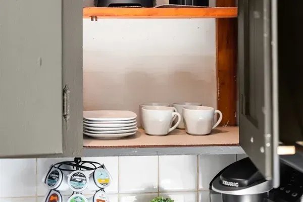 Coffee bar items and blender.