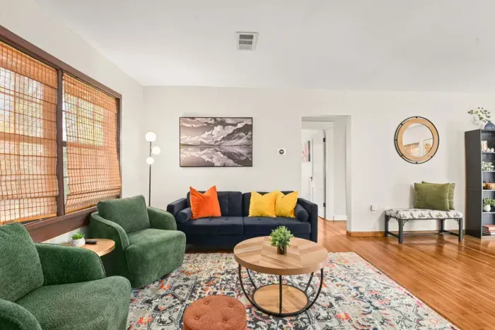 Unwind in the living room of this home, thoughtfully equipped with all the essentials for relaxation and entertainment