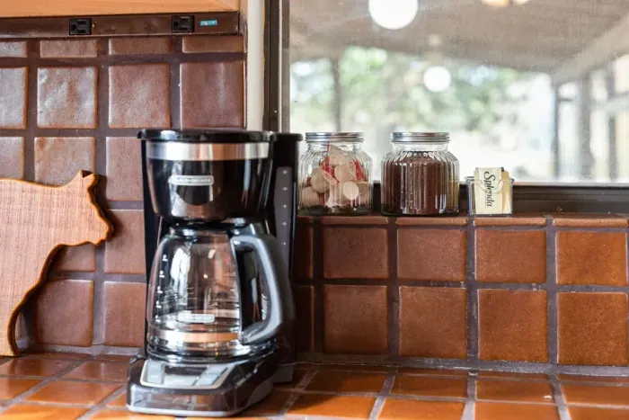 Whether you're a coffee connoisseur or just looking to enjoy a cozy brew, the essentials at the coffee bar promise a delightful and fun-filled experience.