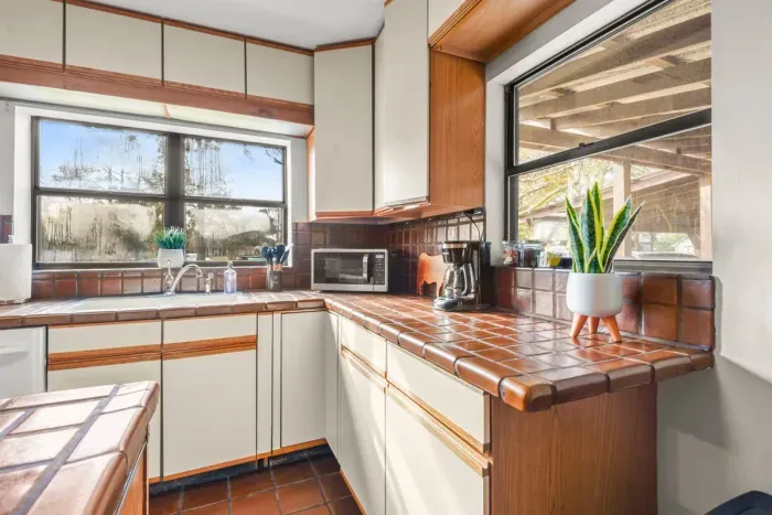 Whether you're a cooking enthusiast or just looking to have fun, this wide kitchen is sure to be a delightful hub for creating and enjoying delicious moments.