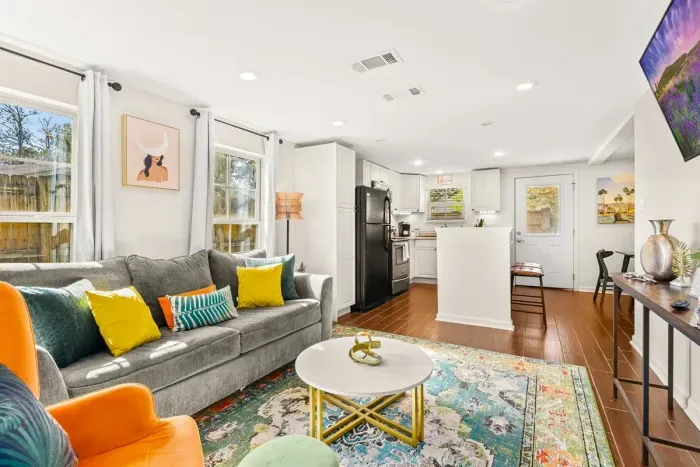 Spacious living room and kitchen for the family to enjoy watching movies or cooking a nice meal.