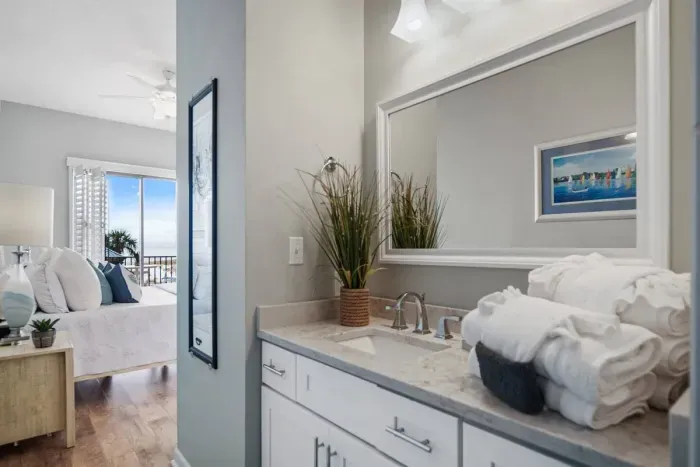 Adjoining master bath suite with plush hotel grade towels & linens.