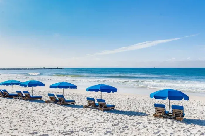 Ocean front relaxation is right in front of you & awaits! Chairs and umbrellas like his are available for rent at the beach.
