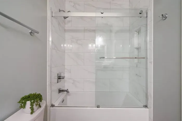 Designer guest bahtub and shower.