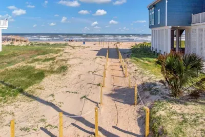 Beach access just across the street! Enjoy a fun golf cart ride to and from!
