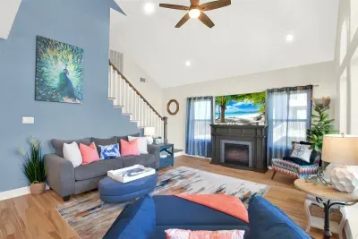 Super Modern living room resign. With electric fireplace and 65 inch TV.