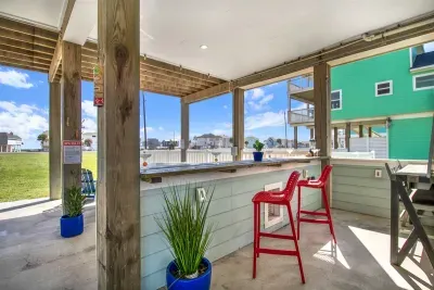 Spacious seating areas on both sides of the tiki bar.