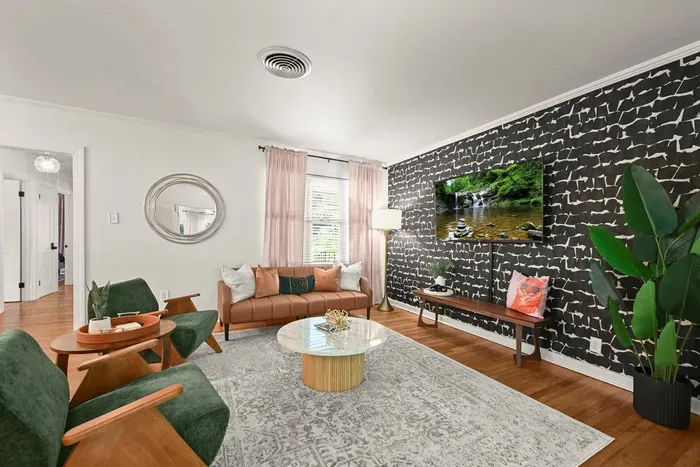 Living Room: Stylish design with chic decor, ample seating, and vibrant natural light awaits you!