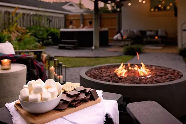 From golden hour to starry night—relax by the fire or soak in the spa for the ultimate backyard escape