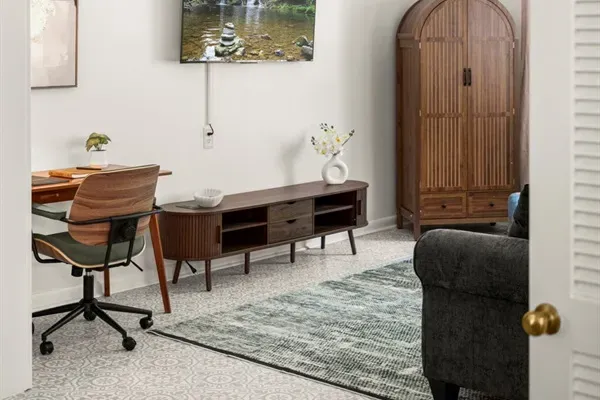 Living Room Retreat: Enjoy modern comforts with stylish decor and a cozy reading nook!