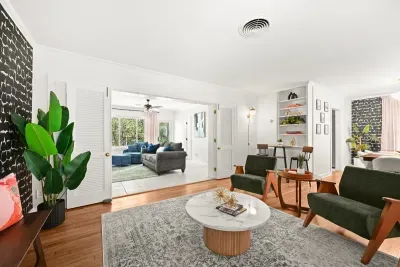 Living Room: Enjoy stylish comfort with vibrant decor and ample natural light! Perfect for gatherings.