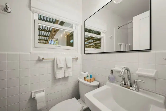 Bathroom: Bright and airy retreat with modern fixtures and a refreshing ambiance!