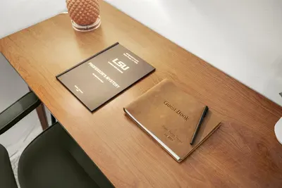 Workspace Retreat: Enjoy a stylish desk with a guest book to share your Baton Rouge stories!