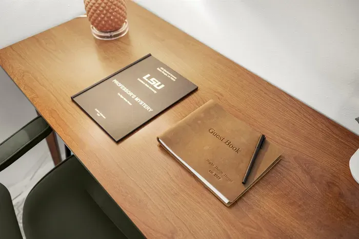 Workspace Retreat: Enjoy a stylish desk with a guest book to share your Baton Rouge stories!
