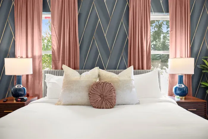 Bedroom Oasis: Elegant decor and natural light create a delightful retreat for restful nights!