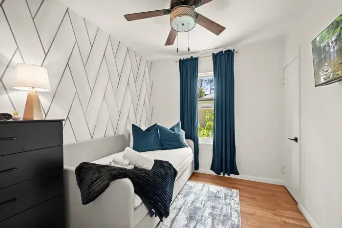 Charming Bedroom Retreat: Bright and airy, perfect for relaxing after exploring Baton Rouge!