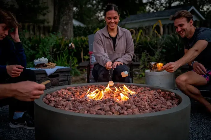 “The ultimate backyard hangout: cozy chairs, glowing fire, and all the s’mores you can eat 🍫🔥.”