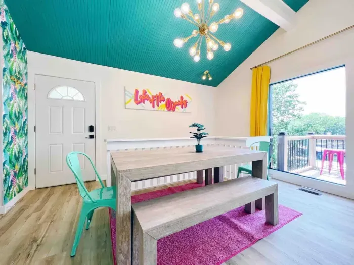 The Palm Entryway with full-sized dining table for 8, perfect for meals or game play- open to the kitchen, great room & overlooking outdoor balcony dining~