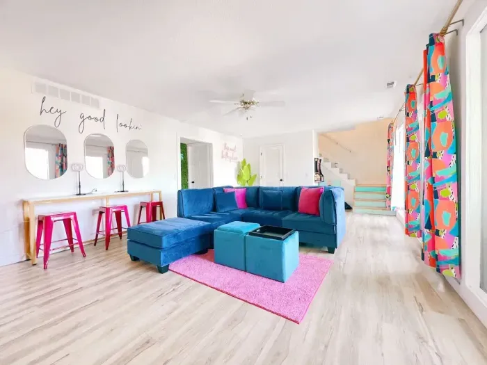 Spacious fully finished lower level that walks out to the oversized deck overlooking the lake & private dock. The lower living area has a modular sofa sectional, beauty bar & hanging chair + blackout curtains & Roku Smart Tv. All new everything!