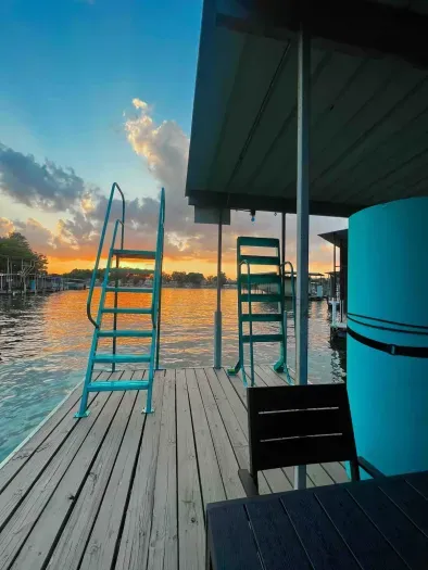 Private dock + High Dive + Wet Steps + Dining/Game Table & Chairs + SUNSETS!
(Please note there is no lily pad at the moment)