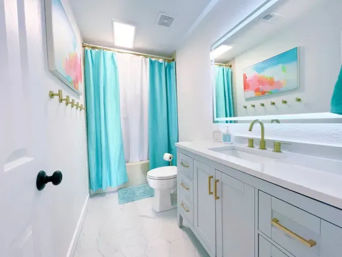 The lower level bath is all new(& clean!)A 48" vanity w/plenty of storage & an LED backlit mirror for perfect lighting.
Provided:
Shampoo, Conditioner, Body wash, makeup wipes, toilet paper roll, hand soap, body lotion, body towels & washcloths
