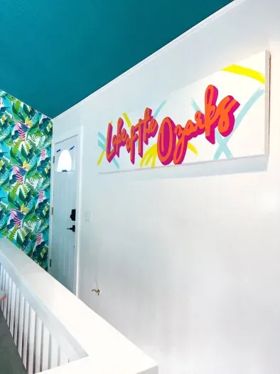 Photo showing entryway and the stairwell to the lower lever.