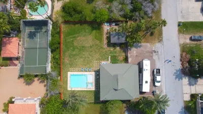 Relax at this coastal escape featuring a sparkling pool, spacious deck, lush lawn, and modern home layout. Ideal for sun‑filled days, outdoor lounging, and peaceful evenings in a private setting designed for comfort, convenience, and memorable stays.