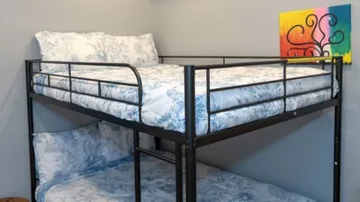 Stylish Bunk Bed Room for Kids/Friends
Fun black metal bunk beds w/ matching floral linens sleep 4 comfortably! Abstract art adds pop, light gray walls keep it breezy. Ideal for families or groups on Galveston getaway!