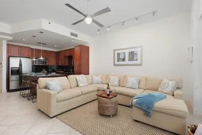 A bright, open living space with soft tones, natural light, and a relaxed flow that feels instantly welcoming. The simple décor and easy layout create a calm, unhurried atmosphere, offering a comfortable place to settle in and enjoy time together.