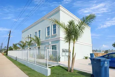 Modern Coastal Duplex | Steps to Beach | Palm-Lined Street | Bright Interiors | Private Yard & Parking | Ideal for Families or Groups | Walk to Dining & Shops | Fast WiFi & Smart TVs | Professionally Managed for Comfort & Cleanliness