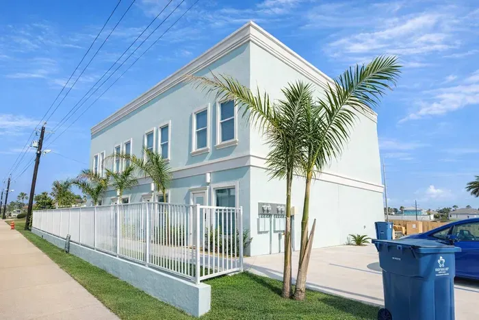 Modern Coastal Duplex | Steps to Beach | Palm-Lined Street | Bright Interiors | Private Yard & Parking | Ideal for Families or Groups | Walk to Dining & Shops | Fast WiFi & Smart TVs | Professionally Managed for Comfort & Cleanliness