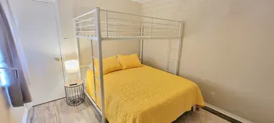 Light & Airy Appeal
Bright & Airy Bedroom | Sunlit Windows, Modern Decor & Comfy Bunker Bed | Calm, Stylish Space for a Beachside Stay
