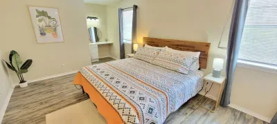 Cozy Coastal Bedroom | Bed + Natural Light | Modern Decor & Warm Tones | Peaceful Retreat Near Beach | Ideal for Couples or Solo Travelers