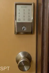 Secure entry featuring a modern keypad lock and brushed‑metal hardware—providing guests with easy, keyless access and added peace of mind while maintaining a polished, well‑maintained exterior for a smooth and reliable arrival experience.