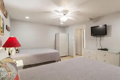 A simple, calming bedroom designed for easy unwinding, with soft tones and a clean layout that makes settling in feel natural. The relaxed atmosphere brings a sense of ease and quiet comfort, creating a space that supports slow mornings and peaceful