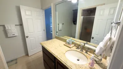 A bright, tidy bathroom with a calm, easy flow that feels refreshing from the moment you step in. Soft tones, simple details, and a clean layout create a space that supports slow mornings, quick resets, and a comfortable rhythm throughout your stay.