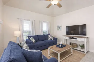 Coastal Comfort | Bright 2BR Retreat w/ Smart TV, Fast WiFi & Steps to Beach