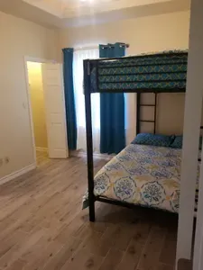 2nd bedroom. Notice these are adult sized bunk beds double beds not twins nor singles. Top bunk holds up to 250 lbs. All tempurpedic style beds too