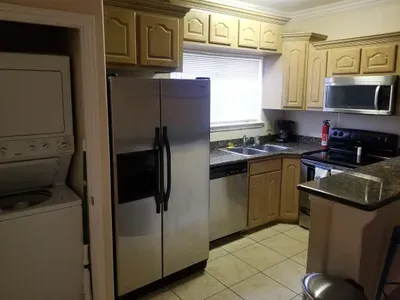 Kitchen. Washer and dryer off it there is a door to close that off by the way